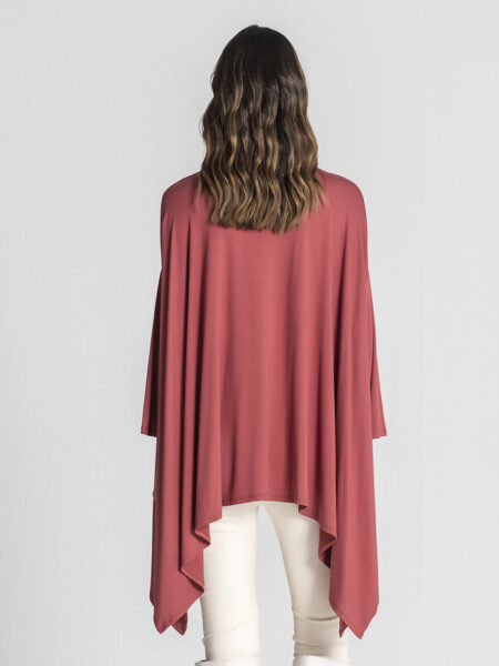 Túnica terracota asimétrica con hebilla en el escote. 95%Viscosa 5%Elastano &nbsp; <strong>El modelo usa talla única y mide 180cm.</strong> Alabama Shop