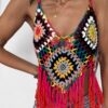 TOP CROCHET MULTICOLOR 3 4 Top de croché multicolor fabricado artesanalmente en Ibiza. Puedes ponerlo por delante o por detrás indistintamente. Con flecos en pico. Piezas únicas. No hay 2 iguales. Talla única. Alabama Shop