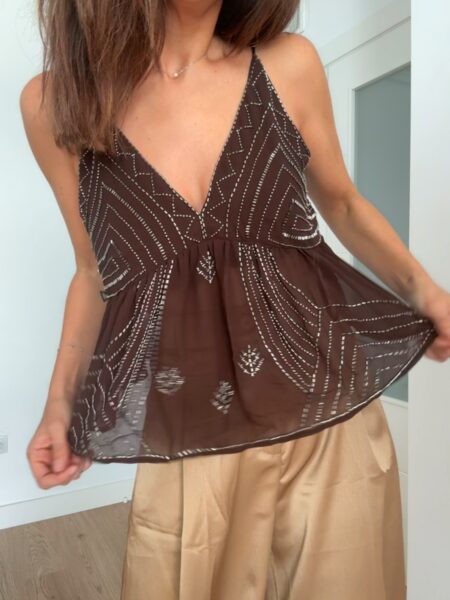 Top de tirantes con pedrería Christmas Edition. 100% poliéster. Alabama Shop